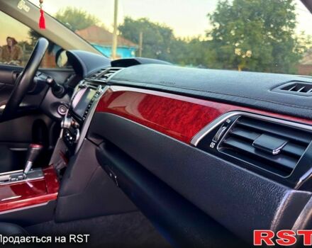 Черный Тойота Камри, объемом двигателя 2.5 л и пробегом 178 тыс. км за 12350 $, фото 7 на Automoto.ua