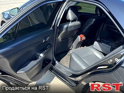Черный Тойота Камри, объемом двигателя 2.5 л и пробегом 238 тыс. км за 14700 $, фото 4 на Automoto.ua