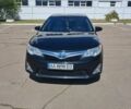 Чорний Тойота Камрі, об'ємом двигуна 2.49 л та пробігом 280 тис. км за 12300 $, фото 1 на Automoto.ua