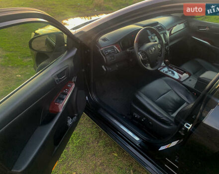 Чорний Тойота Камрі, об'ємом двигуна 2.5 л та пробігом 236 тис. км за 15200 $, фото 13 на Automoto.ua