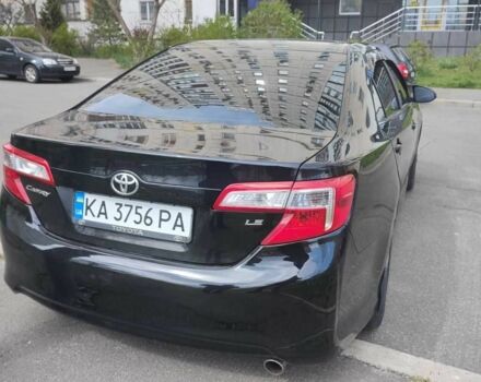 Черный Тойота Камри, объемом двигателя 2.5 л и пробегом 290 тыс. км за 9500 $, фото 1 на Automoto.ua