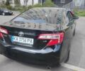 Черный Тойота Камри, объемом двигателя 2.5 л и пробегом 290 тыс. км за 9500 $, фото 1 на Automoto.ua