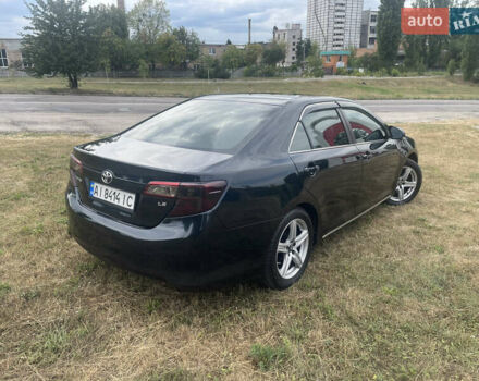 Черный Тойота Камри, объемом двигателя 2.5 л и пробегом 250 тыс. км за 10900 $, фото 3 на Automoto.ua