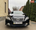 Черный Тойота Камри, объемом двигателя 2.5 л и пробегом 177 тыс. км за 14800 $, фото 1 на Automoto.ua
