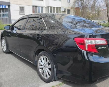 Черный Тойота Камри, объемом двигателя 2.5 л и пробегом 290 тыс. км за 9500 $, фото 17 на Automoto.ua
