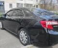 Черный Тойота Камри, объемом двигателя 2.5 л и пробегом 290 тыс. км за 9500 $, фото 17 на Automoto.ua