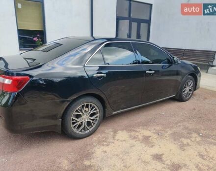 Черный Тойота Камри, объемом двигателя 3.5 л и пробегом 196 тыс. км за 13300 $, фото 1 на Automoto.ua