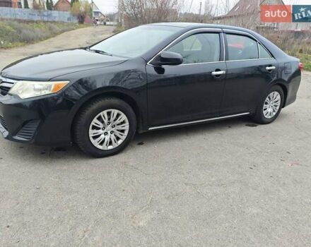 Чорний Тойота Камрі, об'ємом двигуна 2.5 л та пробігом 189 тис. км за 11500 $, фото 7 на Automoto.ua
