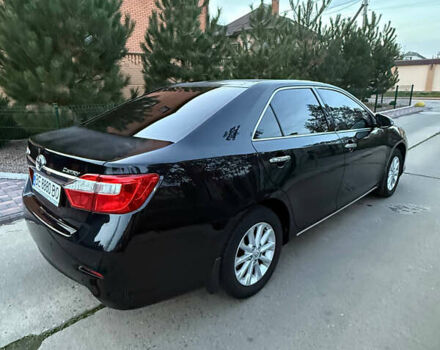 Черный Тойота Камри, объемом двигателя 2.5 л и пробегом 173 тыс. км за 13350 $, фото 7 на Automoto.ua