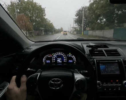 Черный Тойота Камри, объемом двигателя 2.5 л и пробегом 252 тыс. км за 10500 $, фото 2 на Automoto.ua
