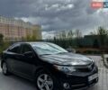 Черный Тойота Камри, объемом двигателя 2.49 л и пробегом 230 тыс. км за 9950 $, фото 1 на Automoto.ua