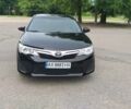 Черный Тойота Камри, объемом двигателя 2.5 л и пробегом 200 тыс. км за 12500 $, фото 1 на Automoto.ua