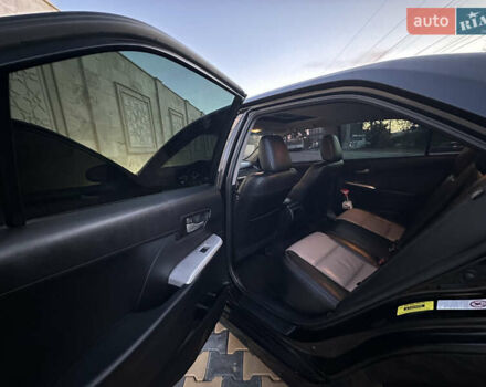 Черный Тойота Камри, объемом двигателя 2.5 л и пробегом 215 тыс. км за 11950 $, фото 26 на Automoto.ua