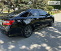 Черный Тойота Камри, объемом двигателя 2.5 л и пробегом 185 тыс. км за 16700 $, фото 14 на Automoto.ua