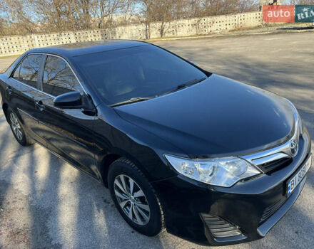 Чорний Тойота Камрі, об'ємом двигуна 2.5 л та пробігом 155 тис. км за 12000 $, фото 4 на Automoto.ua