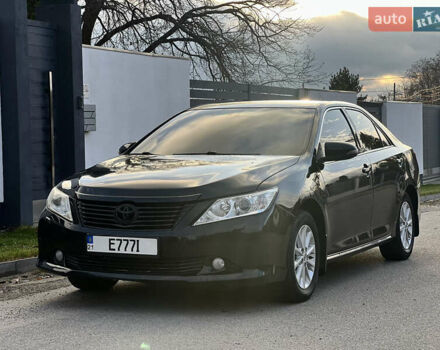 Черный Тойота Камри, объемом двигателя 2.5 л и пробегом 235 тыс. км за 10200 $, фото 1 на Automoto.ua