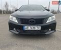Черный Тойота Камри, объемом двигателя 2.5 л и пробегом 227 тыс. км за 14700 $, фото 1 на Automoto.ua