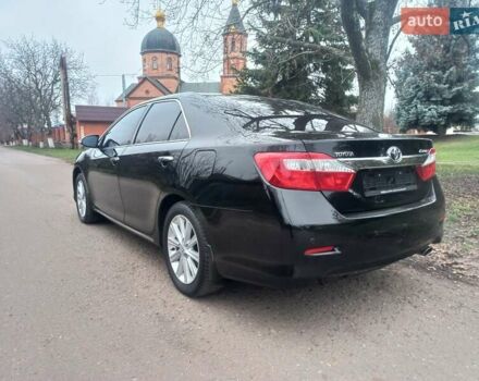 Черный Тойота Камри, объемом двигателя 2.5 л и пробегом 127 тыс. км за 15700 $, фото 3 на Automoto.ua
