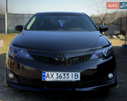 Чорний Тойота Камрі, об'ємом двигуна 2.49 л та пробігом 245 тис. км за 12200 $, фото 1 на Automoto.ua