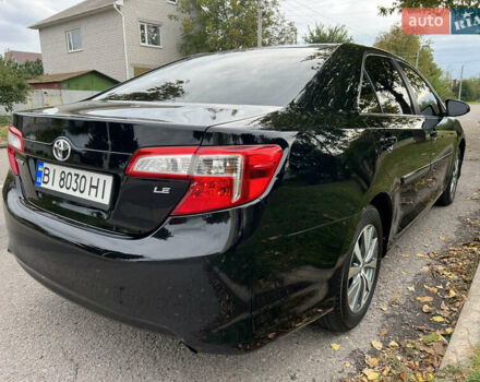 Черный Тойота Камри, объемом двигателя 2.5 л и пробегом 155 тыс. км за 12000 $, фото 2 на Automoto.ua