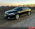 Черный Тойота Камри, объемом двигателя 2.5 л и пробегом 246 тыс. км за 11999 $, фото 1 на Automoto.ua