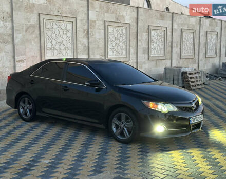 Черный Тойота Камри, объемом двигателя 2.5 л и пробегом 215 тыс. км за 11950 $, фото 22 на Automoto.ua