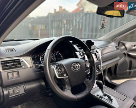 Черный Тойота Камри, объемом двигателя 2.5 л и пробегом 255 тыс. км за 13500 $, фото 19 на Automoto.ua
