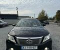 Черный Тойота Камри, объемом двигателя 2.5 л и пробегом 202 тыс. км за 13500 $, фото 1 на Automoto.ua