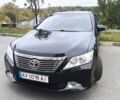 Черный Тойота Камри, объемом двигателя 2.5 л и пробегом 205 тыс. км за 14300 $, фото 1 на Automoto.ua