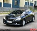 Чорний Тойота Камрі, об'ємом двигуна 2.5 л та пробігом 250 тис. км за 13500 $, фото 1 на Automoto.ua