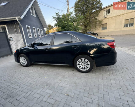 Черный Тойота Камри, объемом двигателя 2.5 л и пробегом 225 тыс. км за 13950 $, фото 14 на Automoto.ua