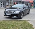 Черный Тойота Камри, объемом двигателя 2.49 л и пробегом 295 тыс. км за 12950 $, фото 1 на Automoto.ua