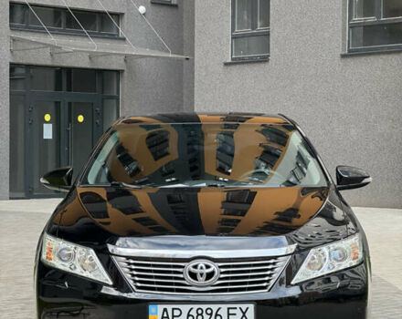 Черный Тойота Камри, объемом двигателя 2.5 л и пробегом 142 тыс. км за 13400 $, фото 1 на Automoto.ua