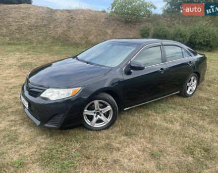 Черный Тойота Камри, объемом двигателя 2.5 л и пробегом 250 тыс. км за 10900 $, фото 5 на Automoto.ua