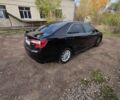Чорний Тойота Камрі, об'ємом двигуна 2.5 л та пробігом 230 тис. км за 9999 $, фото 2 на Automoto.ua