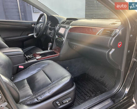 Черный Тойота Камри, объемом двигателя 2.5 л и пробегом 235 тыс. км за 10200 $, фото 8 на Automoto.ua