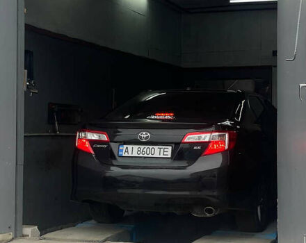 Черный Тойота Камри, объемом двигателя 2.5 л и пробегом 252 тыс. км за 10500 $, фото 3 на Automoto.ua