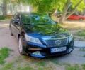 Чорний Тойота Камрі, об'ємом двигуна 2.5 л та пробігом 223 тис. км за 13500 $, фото 1 на Automoto.ua