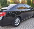 Черный Тойота Камри, объемом двигателя 2.49 л и пробегом 188 тыс. км за 12700 $, фото 2 на Automoto.ua