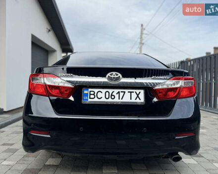Черный Тойота Камри, объемом двигателя 2.5 л и пробегом 255 тыс. км за 13500 $, фото 12 на Automoto.ua