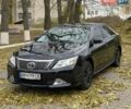 Черный Тойота Камри, объемом двигателя 2.36 л и пробегом 231 тыс. км за 9900 $, фото 1 на Automoto.ua