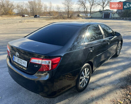 Чорний Тойота Камрі, об'ємом двигуна 2.5 л та пробігом 155 тис. км за 12000 $, фото 6 на Automoto.ua