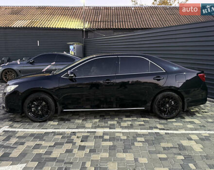 Чорний Тойота Камрі, об'ємом двигуна 2.5 л та пробігом 216 тис. км за 13000 $, фото 2 на Automoto.ua