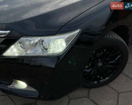 Черный Тойота Камри, объемом двигателя 2.49 л и пробегом 216 тыс. км за 13999 $, фото 1 на Automoto.ua
