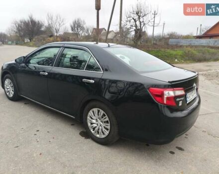 Чорний Тойота Камрі, об'ємом двигуна 2.5 л та пробігом 189 тис. км за 11500 $, фото 1 на Automoto.ua