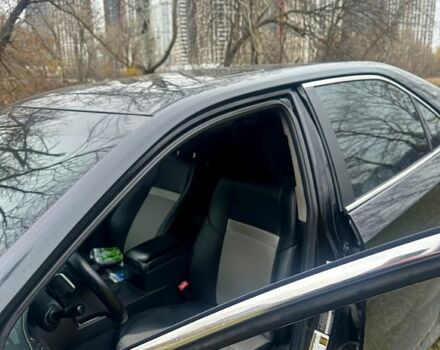 Черный Тойота Камри, объемом двигателя 2.5 л и пробегом 184 тыс. км за 11111 $, фото 4 на Automoto.ua