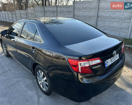Чорний Тойота Камрі, об'ємом двигуна 2.5 л та пробігом 155 тис. км за 12000 $, фото 7 на Automoto.ua