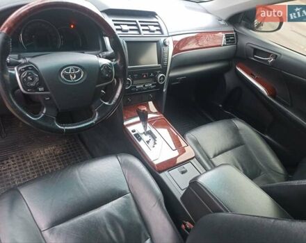 Черный Тойота Камри, объемом двигателя 2.5 л и пробегом 185 тыс. км за 13200 $, фото 1 на Automoto.ua
