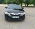 Черный Тойота Камри, объемом двигателя 2.5 л и пробегом 200 тыс. км за 12500 $, фото 1 на Automoto.ua