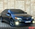 Чорний Тойота Камрі, об'ємом двигуна 2.5 л та пробігом 215 тис. км за 11950 $, фото 1 на Automoto.ua